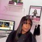 a woman in a hair salon