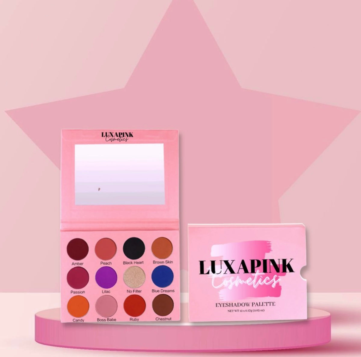 a pink palette of eyeshadow and a pink box