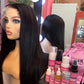 a mannequin with long hair and a pink bag