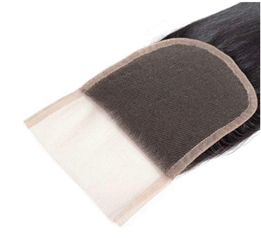 a piece of hair with a white patch
